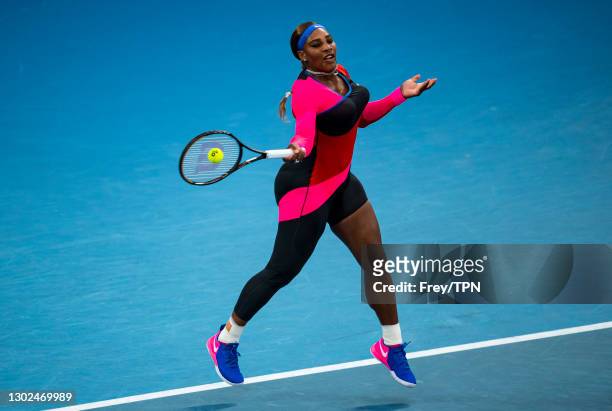 Serena Williams of the United States hits a forehand against Simon Halep of Romania during day nine of the 2021 Australian Open at Melbourne Park on...