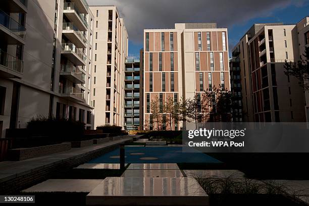 A courtyard garden between structurally complete apartment blocks is seen at the Olympic Village in the Olympic Park on October 25, 2011 in east...