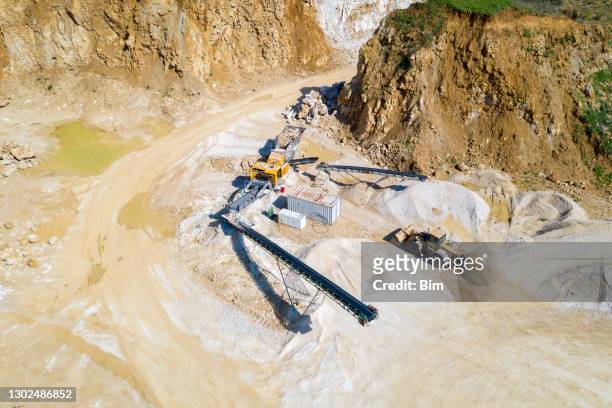open pit mining for sand and gravel, aerial view - sandstone stock pictures, royalty-free photos & images