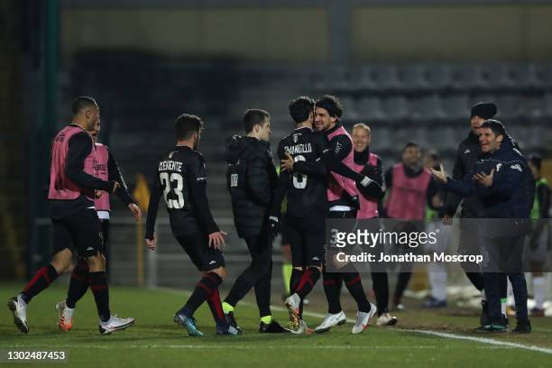 Simone Emmanuello of Pro Vercelli celebrates with team mates and staff after scoring to give the side a 2-0 lead during the Lega Pro Serie C match...