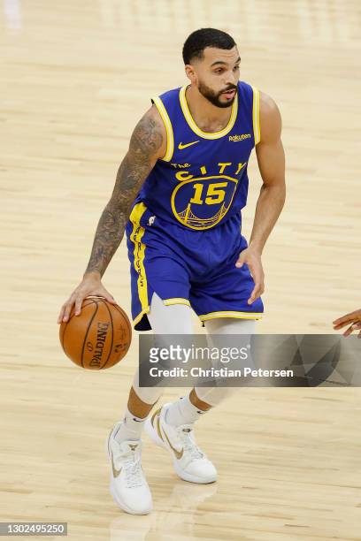 Mychal Mulder of the Golden State Warriors handles the ball during NBA game against the Phoenix Suns at Phoenix Suns Arena on January 28, 2021 in...