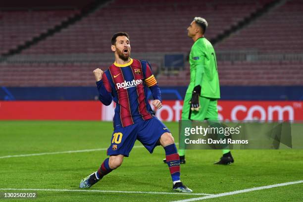 Lionel Messi of FC Barcelona celebrates after scoring their side's first goal during the UEFA Champions League Round of 16 match between FC Barcelona...