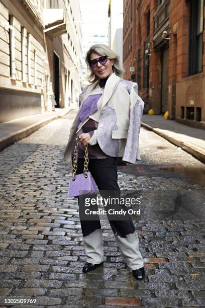 Olga Ferrara poses for a photo during New York Fashion Week: The Shows at Spring Studios on February 16, 2021 in New York City.