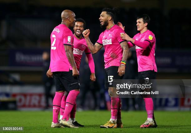 Andre Wisdom and Colin Kazim-Richards of Derby County celebrate after the Sky Bet Championship match between Wycombe Wanderers and Derby County at...