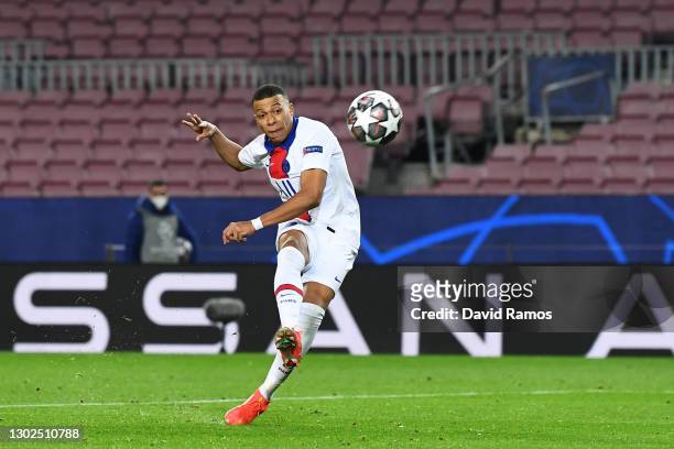 Kylian Mbappe of Paris Saint-Germain scores their side's fourth goal during the UEFA Champions League Round of 16 match between FC Barcelona and...
