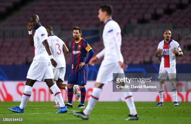 Lionel Messi of FC Barcelona reacts after conceding their fourth goal during the UEFA Champions League Round of 16 match between FC Barcelona and...