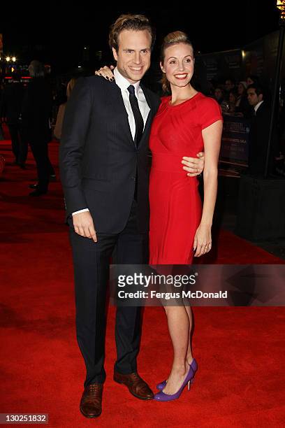 Rafe Spall and his wife Elize du Toit attend the premiere for 'Anonymous' at The 55th BFI London Film Festival at The Empire Leicester Square on...