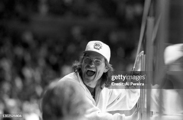 Kurt Russell cheers when he attends the St Louis Blues v Los Angeles Kings game at the Great Western Forum on March 20 in Inglewood, California. The...