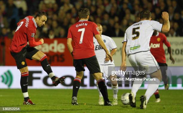 Dimitar Berbatov of Manchester United scores their first goal during the Carling Cup fourth round match between Aldershot Town and Manchester United...