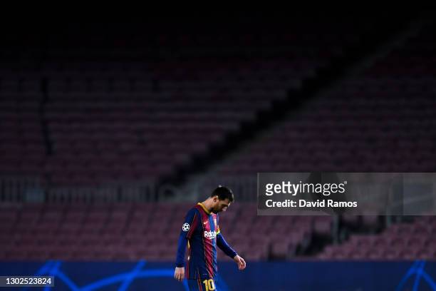 Lionel Messi of FC Barcelona shows his dejection during the UEFA Champions League Round of 16 match between FC Barcelona and Paris Saint-Germain at...