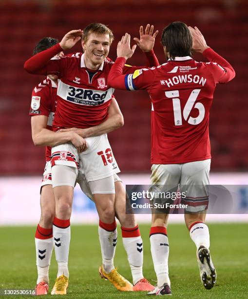 Boro player Duncan Watmore celebrates his goal with Jonny Howson and Paddy McNair during the Sky Bet Championship match between Middlesbrough and...