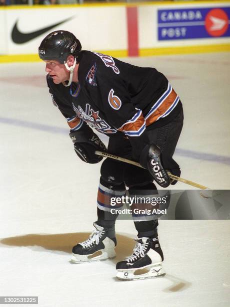 Calle Johansson of the Washington Capitals skates against the Toronto Maple Leafs during NHL game action on January 30, 1999 at Maple Leaf Gardens in...