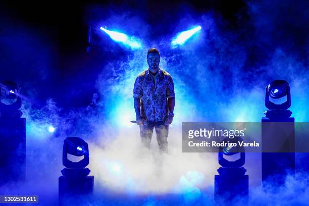 Luis Fonsi performs onstage during rehearsals for Univision's 33rd Edition of Premio Lo Nuestro a la Música Latina at AmericanAirlines Arena on...