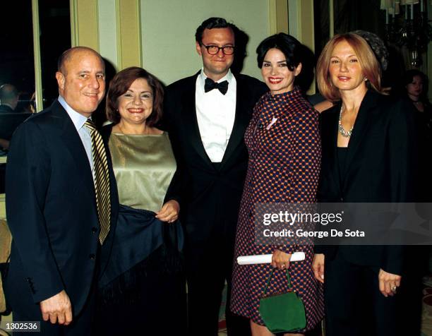 Revlon CEO Ronald O. Perelman, president of the National Breast Cancer Coalition Fran Visco, actress Karen Duffy, her husband John Lambros, and...