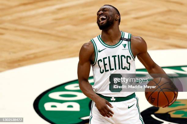 Kemba Walker of the Boston Celtics laughs during the fourth quarter against the Denver Nuggets at TD Garden on February 16, 2021 in Boston,...