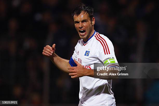 Heiko Westermann of Hamburg reacts during the DFB Cup second round match between Eintracht Trier and Hamburger SV at Moselstadion on October 25, 2011...