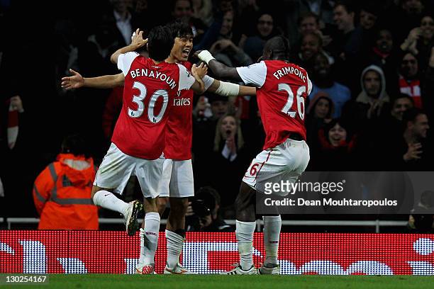 Park Chu-Young of Arsenal is congratulated by team mates after scoring his teams second goal of the game during the Carling Cup Fourth Round match...