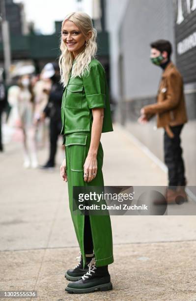 Zanna Roberts Rassi is seen wearing a green top and skirt outside the Rebecca Minkoff show during New York Fashion Week F/W21 at Spring Studios on...