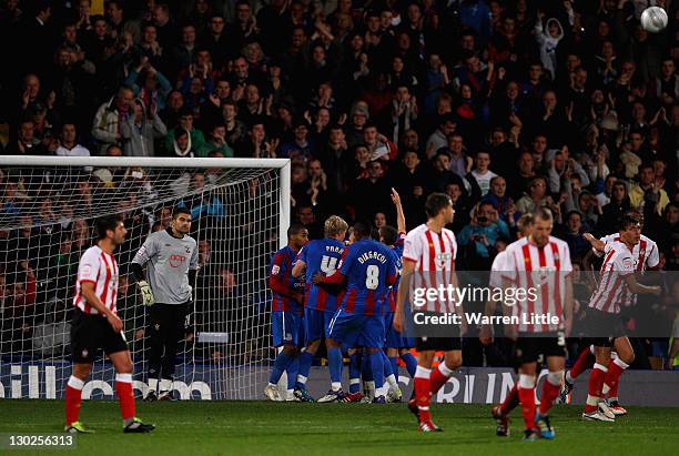 Jermaine Easter of Crystal Palace is congartulated by his team mates after scores a penalty to make the score 2-0 during the Carling Cup Fourth Round...