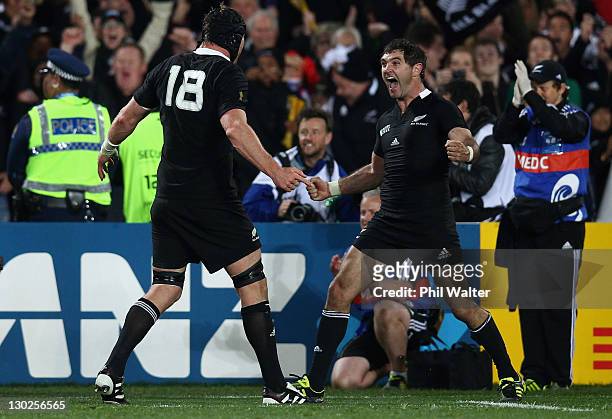Stephen Donald of the All Blacks celebrates on full time with Ali Williams during the 2011 IRB Rugby World Cup Final match between France and New...