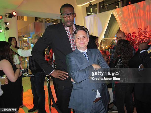 Player Amar'e Stoudemire and Jason Binn attend the Gotham Magazine Men's Issue cover party at Land Rover of Manhattan on October 12, 2011 in New York...