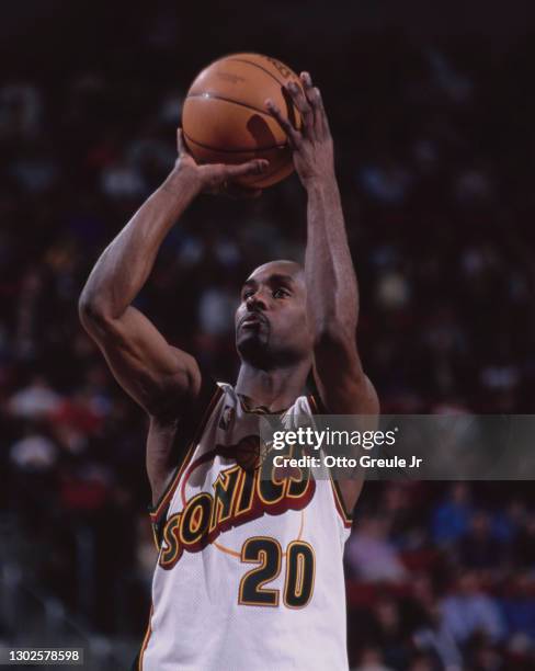 Gary Payton, Point Guard for the Seattle SuperSonics attempts to shoot a free throw during the NBA Pacific Division basketball game against the...