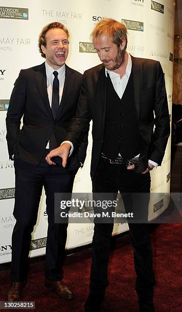 Actors Rafe Spall and Rhys Ifans attend the premiere of 'Anonymous' during the 55th BFI London Film Festival at Empire Leicester Square on October...