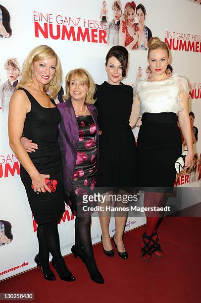 Actress Monika Gruber, Gisela Schneeberger, Bettina Mittendorfer and Rosalie Thomass attend "Eine Ganz Heisse Nummer" Germany premiere at the...