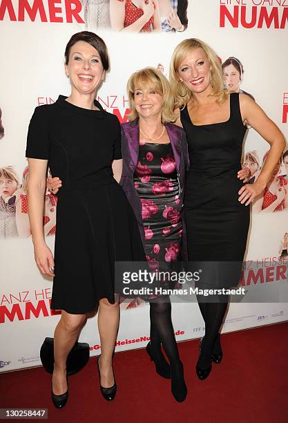 Actress Bettina Mittendorfer, Gisela Schneeberger and Monika Gruber attend "Eine Ganz Heisse Nummer" Germany premiere at the Mathaeser Filmpalast on...