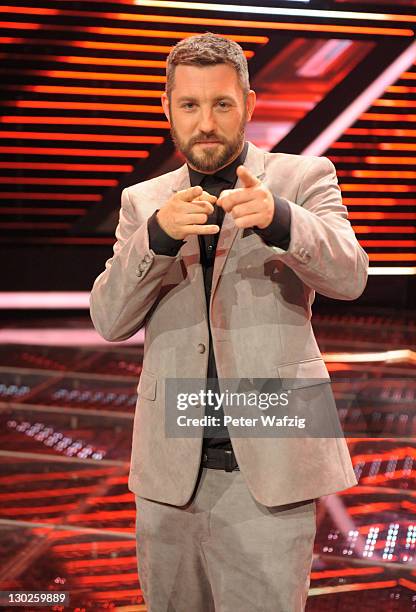 Jury member Mirko Bogojevic during the winners photocall at the 'The X Factor Live' TV-Show on October 25, 2011 in Cologne, Germany.