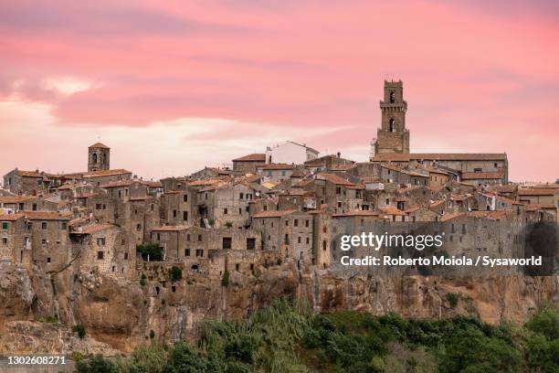 stone houses of pitigliano at sunrise, tuscany, italy - fairytale village stock pictures, royalty-free photos & images