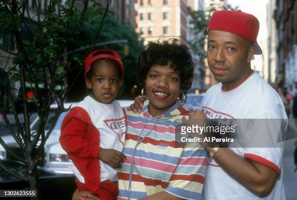 Rapper Nikki D appears in a portrait with her son, Davon, and her Def Jam label head Russell Simmons, taken on June 8, 1992 in New York City.