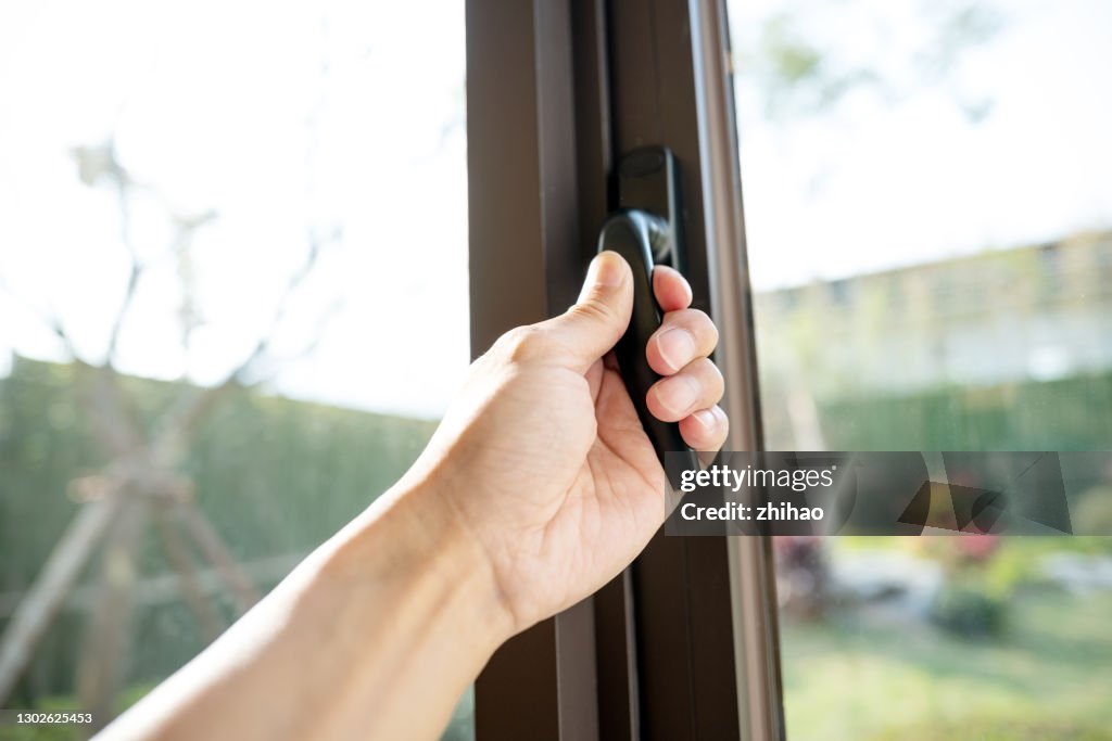 Long Hand Window Human Hand Ready To Open The Window High-Res Stock Photo - Getty Images