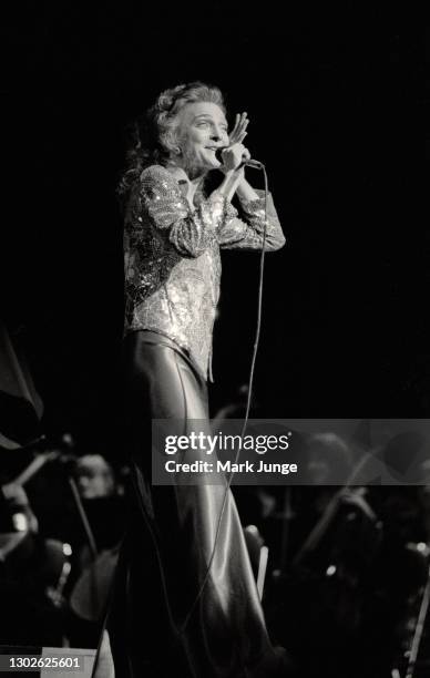 Judy Collins sings with the Cheyenne Symphony Orchestra at the Cheyenne Civic Center on November 3, 1984 in Cheyenne, Wyoming. Collins is an American...