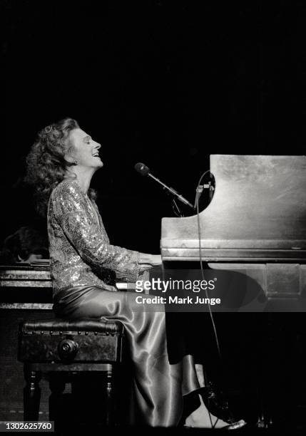 Judy Collins sings and plays the piano with the Cheyenne Symphony Orchestra at the Cheyenne Civic Center on November 3, 1984 in Cheyenne, Wyoming....