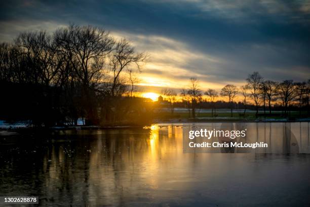 sunset on the lake at pontefract race course - pontefract stock pictures, royalty-free photos & images