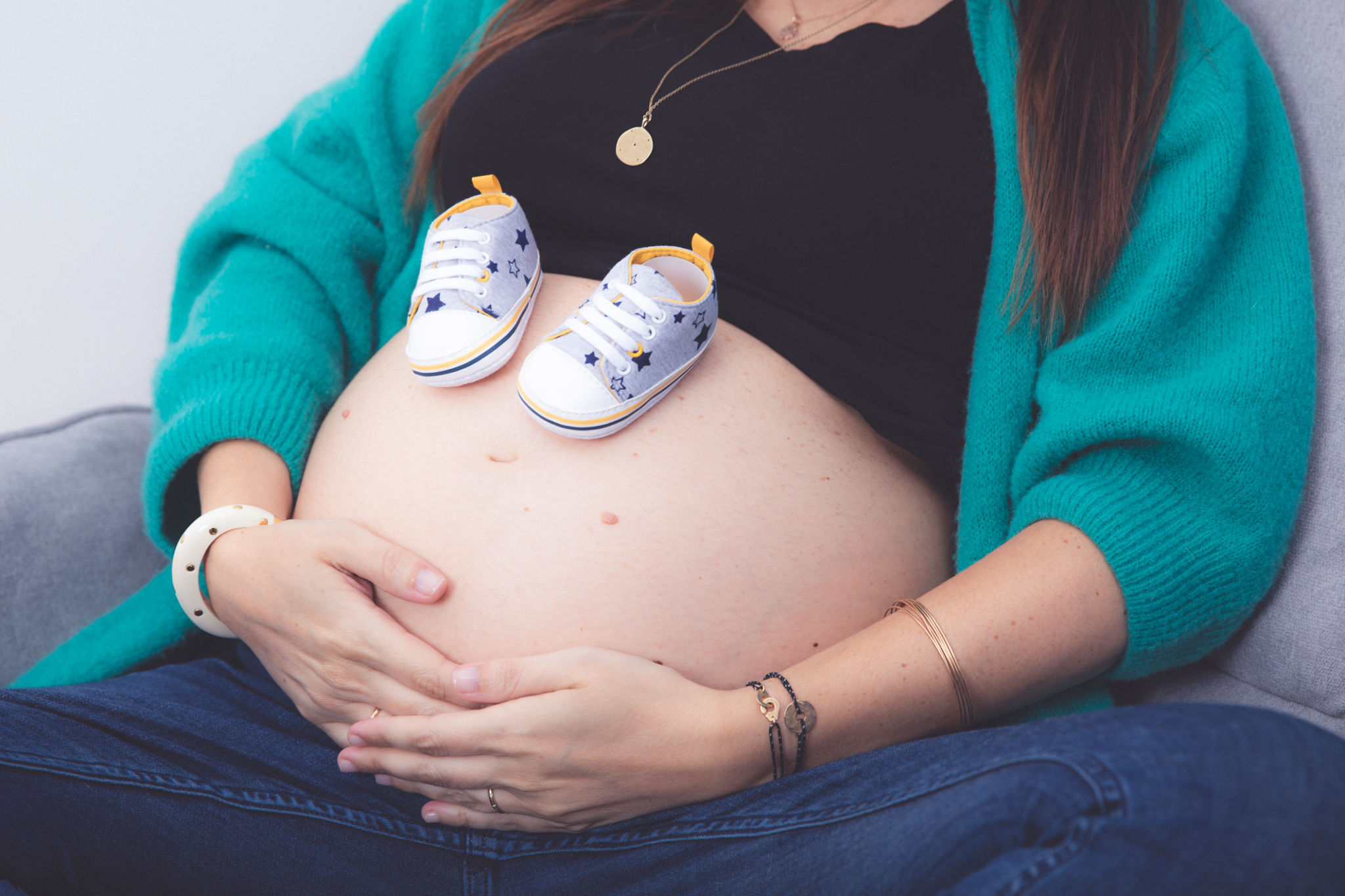 A big belly and mini shoes A big belly and mini shoes