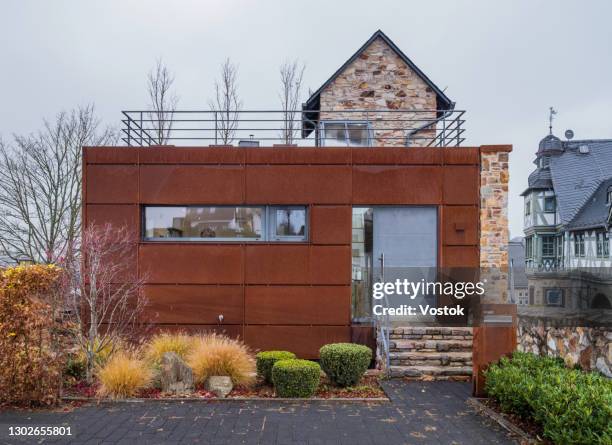 modern house covered with metal panels in germany - einfamilienhaus modern stock-fotos und bilder