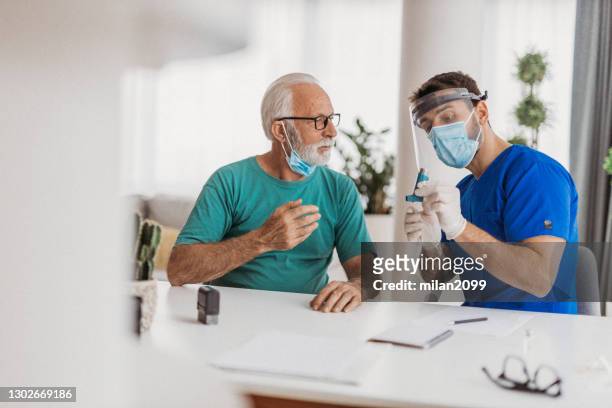 visiting the doctor - copd stock pictures, royalty-free photos & images
