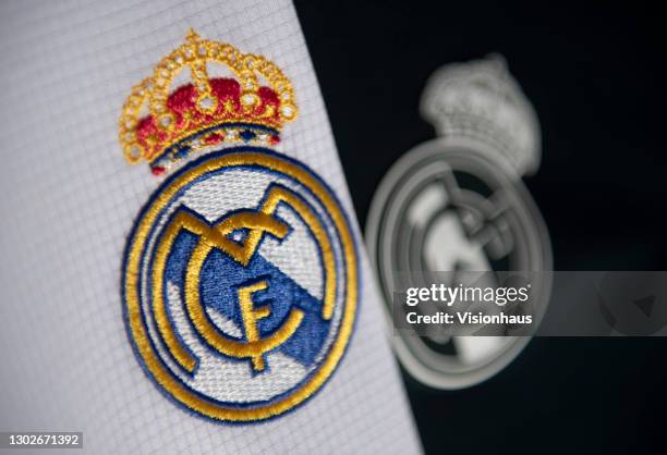 The Real Madrid club badge on their shirts on February 11th, 2021 in Manchester, United Kingdom.