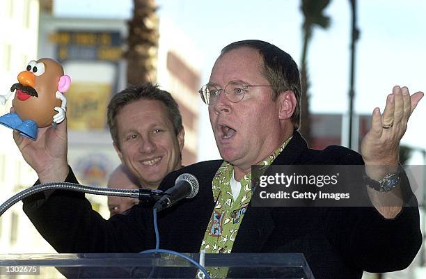 Toy Story creators John Lasseter, right, and Peter Schneider at event honoring Don Rickles with a star on the famous Hollywood Walk of Fame October...