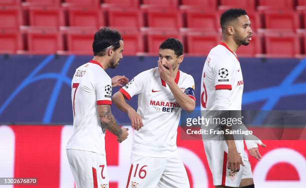 Suso of Sevilla celebrates with Jesus Navas after scoring his team's first goal during the UEFA Champions League Round of 16 match between Sevilla FC...