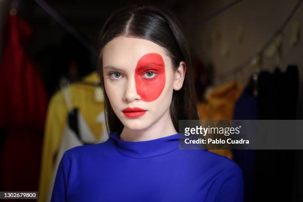 Model is seen backstage before the 'Relieve' fashion show at the White Lab Gallery on February 17, 2021 in Madrid, Spain.