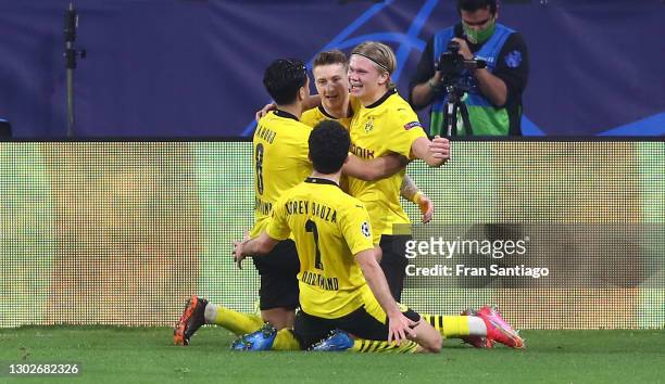 Erling Haaland of Borussia Dortmund celebrates with Marco Reus and team mates after scoring their side's third goal during the UEFA Champions League...