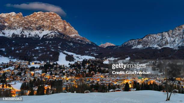 cortina d'ampezzo at blue hour - cortina stock pictures, royalty-free photos & images