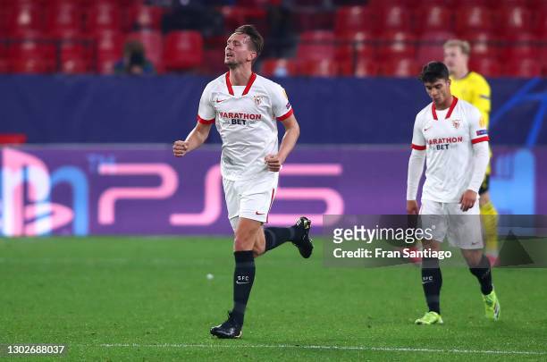 Luuk de Jong of Sevilla celebrates after scoring his team's second goal during the UEFA Champions League Round of 16 match between Sevilla FC and...