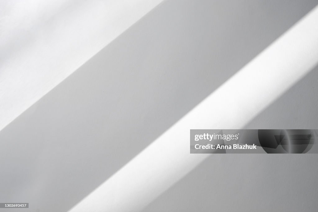 Trendy photography effect of sun light reflection over white background for overlay