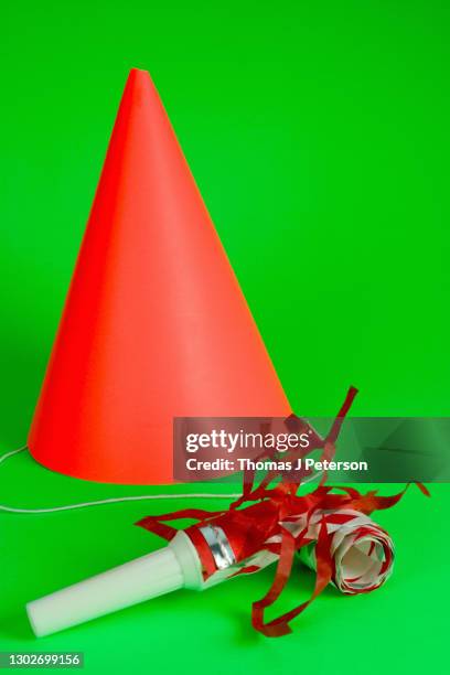 party hat with party horn blower, close-up - party horn blower bildbanksfoton och bilder