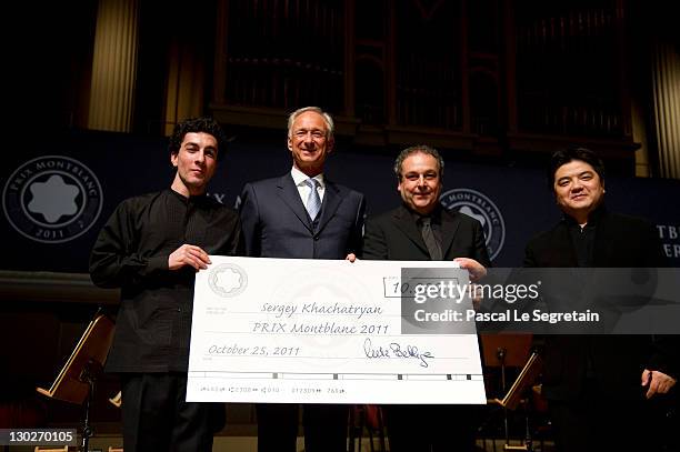 Award winner Sergey Khachatryan, Lutz Bethge , Prof. Dr. Juergen Christ and Prof. Li Biao attend the PRIX Montblanc 2011 at the "Konzerthaus am...