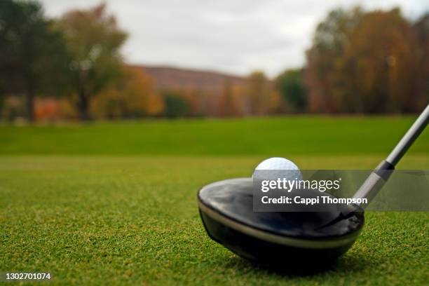 golf ball on tee - teeing off stock pictures, royalty-free photos & images